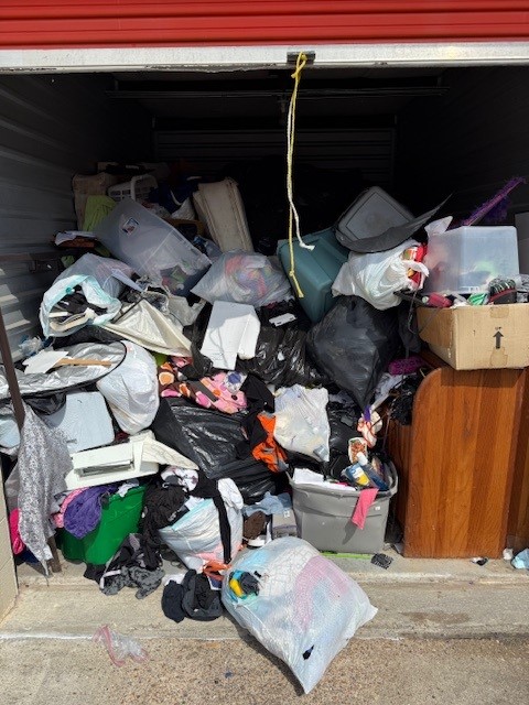 Before storage unit cleanout with heavy junk and debris removal in Houston Texas