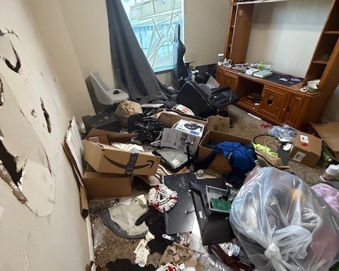 Apartment trash-out cleanout with heavy debris and junk removal in Houston Texas