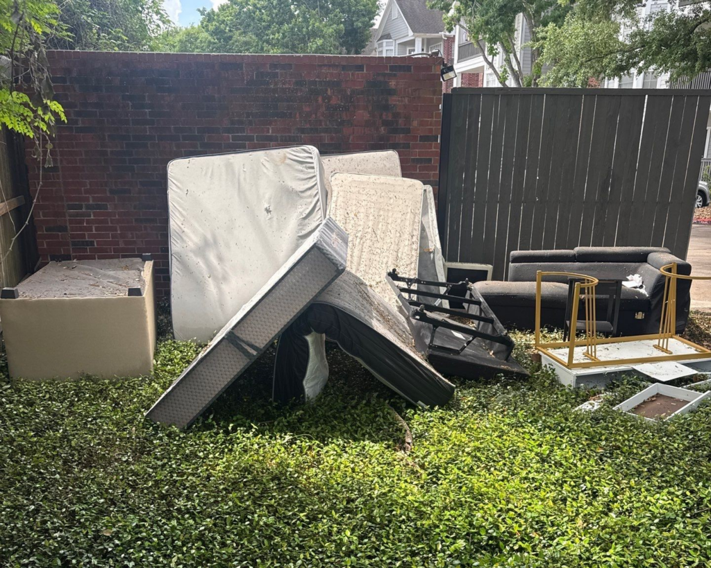 Bulk and heavy trash removal including mattresses and furniture at apartment complex in Houston Texas